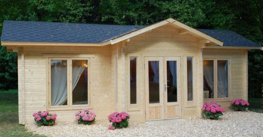 Check Out This Cute Cozy Courtyard Cabin Kit For $22,000